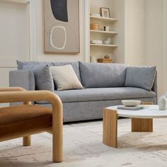 a living room filled with furniture and decor