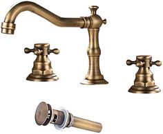 two faucets and one shower head are shown