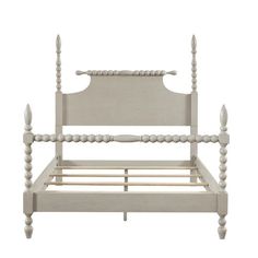 a white bed frame with wooden posts and nails on the headboard, against a white background