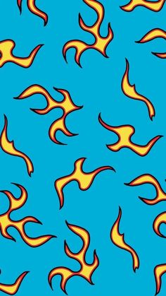 a blue background with yellow and red flames