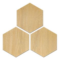 three wooden hexagonals on a white background