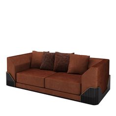 a brown couch with four pillows on it's back and one arm folded up