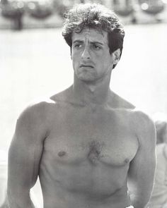 black and white photograph of a shirtless man