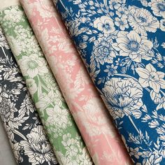 four different types of fabric with flowers on them