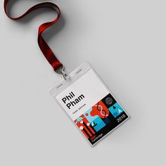 an id badge with a red lanyard attached to it on a gray background that says phiri phhan