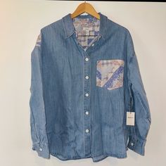 Brand New With Tags. Denim Button Down Shirt / Shacket Featuring A Basic Collar, Quilted Floral Patternblock Detailing On The Chest Patch Pocket And Back Yoke, Dropped Long Sleeves, Button-Front Closures, And A Curved Hem. - Shell 1: 100% Cotton - Shell 2: 100% Polyester Spring Light Wash Button-up Denim Top, Light Wash Denim Top With Buttoned Pockets For Spring, Spring Chambray Denim Top With Button Closure, Relaxed Fit Denim Top With Button Closure For Spring, Spring Medium Wash Denim Top With Buttoned Pockets, Spring Denim Top With Buttoned Pockets In Medium Wash, Spring Denim Top With Button Closure And Relaxed Fit, Spring Everyday Denim Top With Button Closure, Spring Cotton Button-up Denim Top