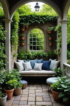 an outdoor seating area with potted plants