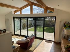 an open living room with sliding glass doors