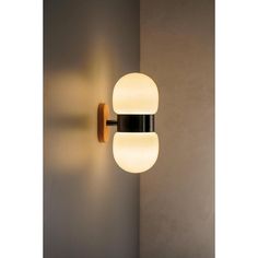 a wall light that is on the side of a wall