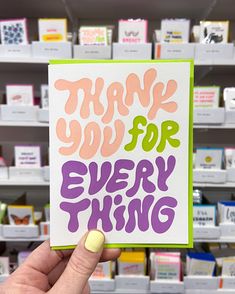 a hand holding up a card with the words thank you for every thing on it