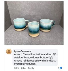 three coffee mugs sitting next to each other