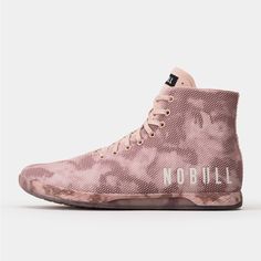 a pink sneaker with the word nobil on it