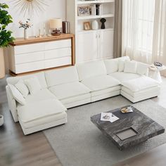 a large white sectional sofa in a living room