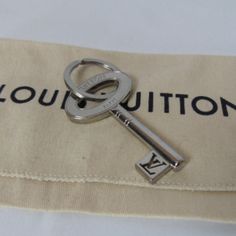 Louis Vuitton L. Vuitton Travel Key Holder Keychain Height: 3 In Length: 1.75 Date Code: M67143 Di0241 Great Condition! It Shows Some Light Wear. Minor Surface Markings, Rubbings. Light Chip Near L. Vuitton Script (Shown In Pics) Dust Bag Included. Guaranteed Authentic! Happy Poshing! Louis Vuitton Key Holder With Keys, Lv Key Chains, Louis Vuitton Keyring, Louis Vuitton 4 Key Holder, Louis Vuitton Key Holder, Monogram Quilt, Key Holder Wallet, Louis Vuitton Key Pouch, Louis Vuitton Travel