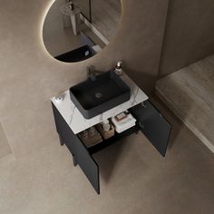 an aerial view of a bathroom sink and mirror