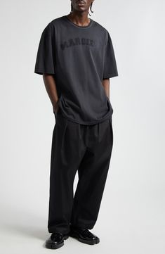 A voluminous pleated silhouette inspired by skating culture enhances the easygoing style of these baggy-fit chinos topped with an elastic waist. Elastic waist Side-seam pockets; back patch pocket 100% cotton Dry clean Made in Italy Designer Clothing Formal Street Wear Men, Mens Streetwear Shirts, Clean Style Outfit Men, Baggy Black Pants Outfit, Boy Style Summer, Oversized Tshirt Aesthetic, Guy Street Style, Uniqlo Outfit, Boys Streetwear