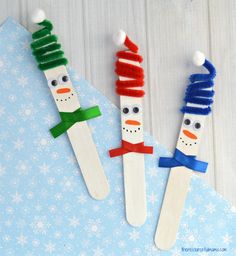 popsicle snowmen are made to look like toothpicks