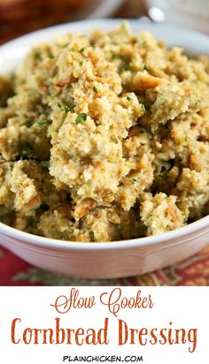 slow cooker cornbread dressing in a white bowl on a colorful tablecloth with text overlay