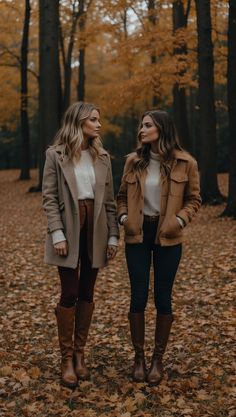 Two women in stylish fall outfits, wearing coats and boots, standing in a forest of autumn leaves. Plus Size Fall Outfit Photoshoot, Fall Outfits For Pumpkin Patch, Apple Picking Outfit Fall Casual, Plaid Shirt Outfit Fall, Fall Photoshoot Outfits, Picking Outfits, Amber Design, Apple Picking Outfit, Fall Photo Shoot Outfits