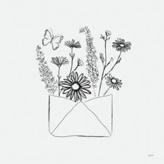 an envelope with flowers in it and butterflies flying around the envelope is drawn by hand