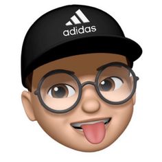 a man wearing glasses and a hat with the word adidas on it's face