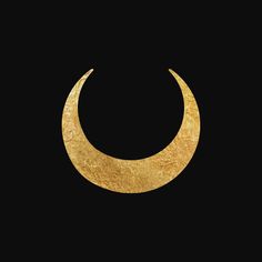 a gold crescent on a black background