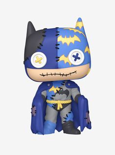 the batman pop vinyl figure is wearing a blue and yellow costume with black ears, bat wings