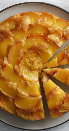 a sliced pineapple upside down cake on a plate