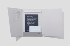 an open book with a quote on the front and back cover, in white paper