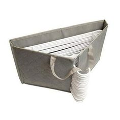 a large gray storage bag with white plates in the bottom and handles on each side