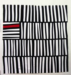 a piece of art with black and white stripes on the bottom, red line in the middle