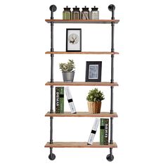 three shelves with books, plants and pictures on top of each shelf in front of a white background