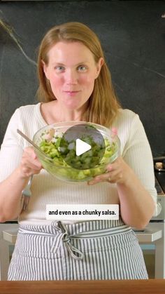 a woman holding a bowl of food in front of her face and the caption reads, and even as a chunky salad