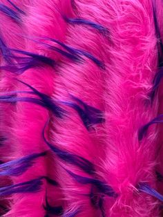 pink and purple feathers with black tips