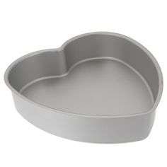 a heart shaped cake pan on a white background