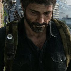 a man with a backpack looking down at his cell phone in the video game unchacked