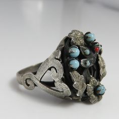 Wonderful estate sterling victorian silver bird ring. size 4.75. 5.3grams. circa 1900's. unmarked acid tests for sterling silver. great shape. 19.41mm face. Vintage One-of-a-kind Wedding Rings, Antique Turquoise Anniversary Ring, Antique Turquoise Ring For Anniversary, Antique Turquoise Ring For Wedding, Antique Turquoise Round Ring For Wedding, Antique Round Turquoise Wedding Ring, Vintage Hallmarked Turquoise Ring For Collectors, Antique Silver Turquoise Ring With Patina, Antique Turquoise Cabochon Ring For Wedding