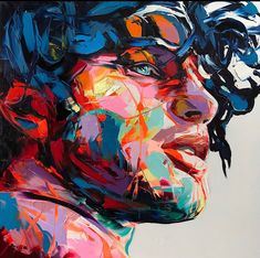 an abstract painting of a man's face with blue and red colors on it