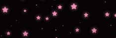 pink stars are flying in the dark sky