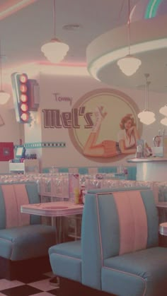 the interior of a diner with checkered flooring