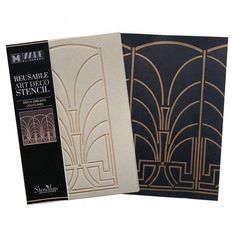 two books with art deco stencils on the front and back covers in gold