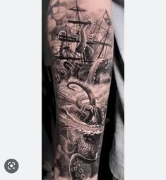 an octopus and ship tattoo on the arm