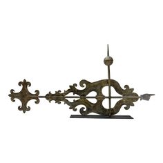 an old fashioned weather vane on a white background