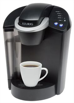 the keurig coffee maker is ready to be filled with hot chocolate or espresso