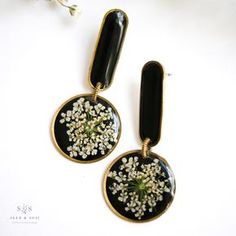 Artistic Black Dangle Jewelry, Black Resin Dangle Jewelry, Trendy Handmade Brass Earrings, Trendy Black Earrings For Gift, Artistic Black Drop Earrings, Handmade Black Artsy Jewelry, Artsy Handmade Black Jewelry, Black Enamel Dangle Earrings For Gift, Black Enamel Earrings, Pierced