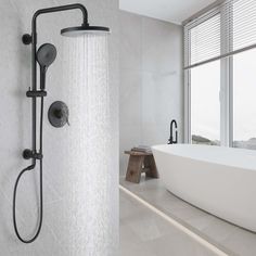 a large white bathtub sitting next to a window in a bathroom with an open shower head