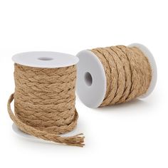 two spools of twine on white background