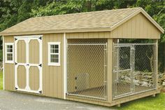 a small dog house with a fence around it