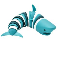 a blue and white striped fish toy on a white background