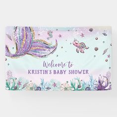 a mermaid themed welcome sign for a baby shower